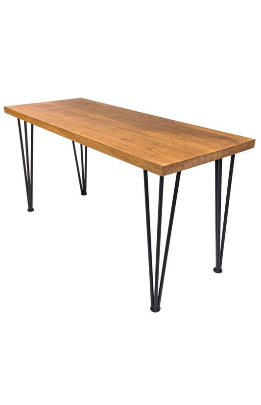Rectangular wooden table with black metal hairpin legs in industrial style