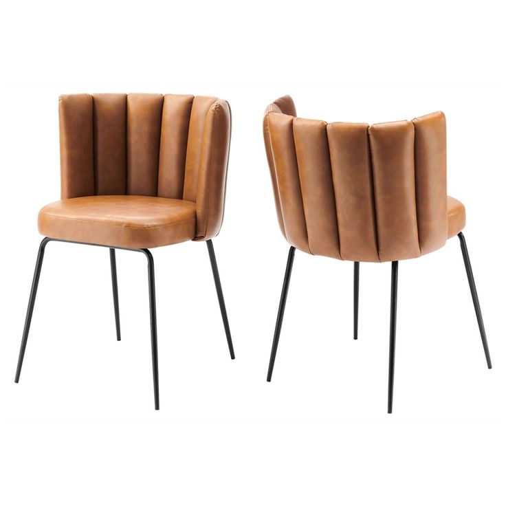Tan faux leather chair with vertical channel tufted back and black metal legs
