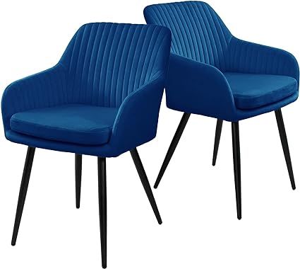 royal blue velvet armchairs with ribbed backs and slim black legs, modern and elegant design.