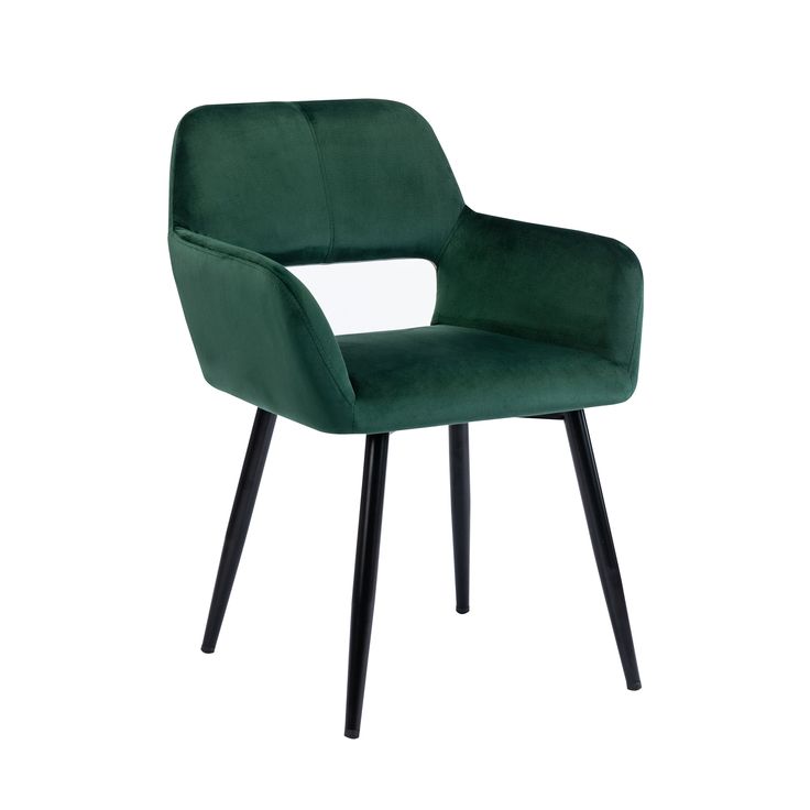 Forest green velvet armchair with cut-out back and black tapered legs.