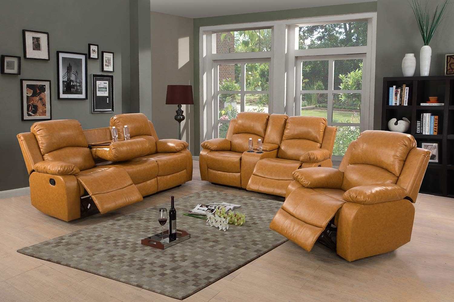 Premium 3+2+1 tan leather recliner sofa set arranged in a modern living room with large windows, decorative wall frames, and a soft patterned rug.