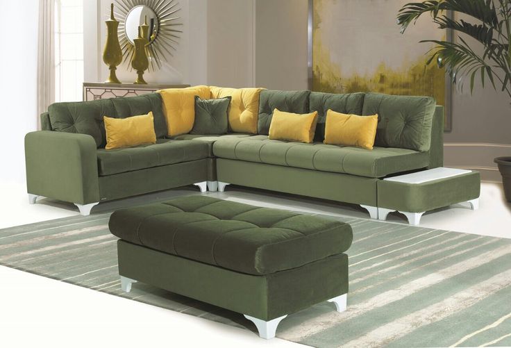Elegant green L-shaped sectional sofa with yellow cushions, matching ottoman, and built-in side table - perfect for modern homes.