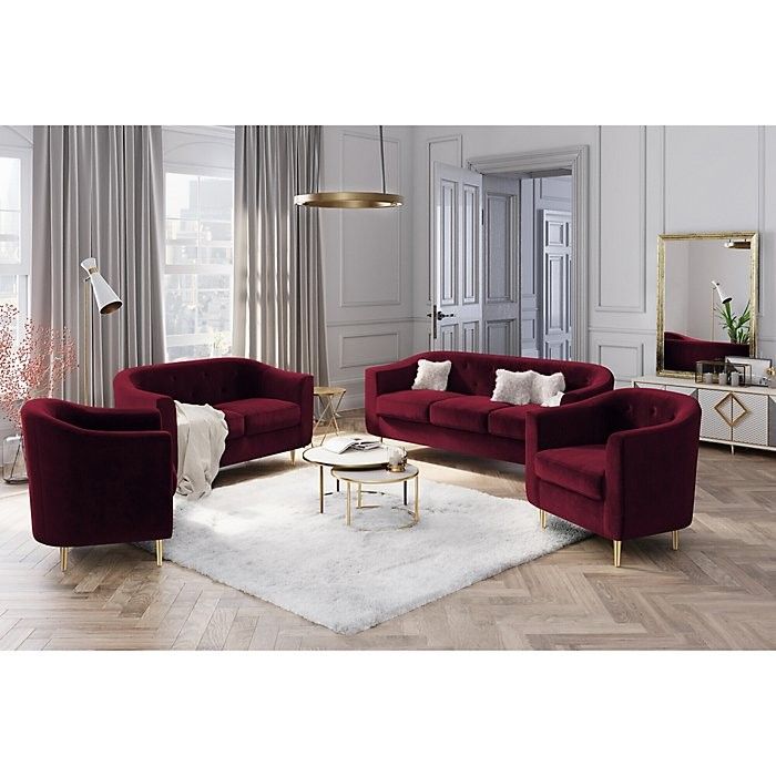 Stylish burgundy velvet sofa set with gold legs, featuring a 3-seater and two 1-seater sofas, perfect for luxury living room decor.