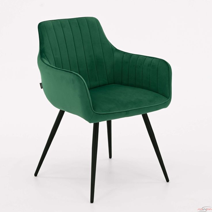 Emerald green velvet chair with vertical stitched backrest and black tapered legs.