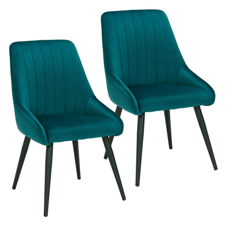 teal velvet dining chairs with vertical tufting and black tapered legs, displayed on white background.